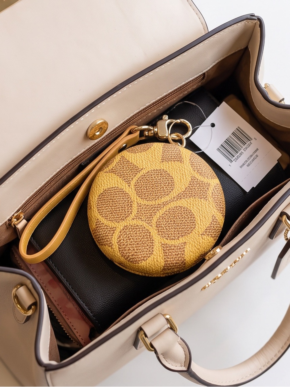 Monogram Compact Mirror Wristlet in Tan